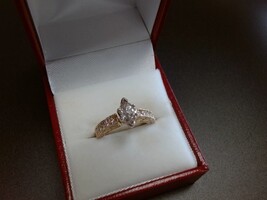 14kt Yellow Gold Marquis Diamond Aprox. .50ct 5 round diamonds on each side